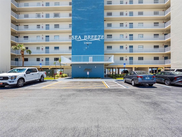 13500 Gulf Blvd Unit 506, Madeira Beach, FL 33708 - view of building exterior featuring uncovered parking