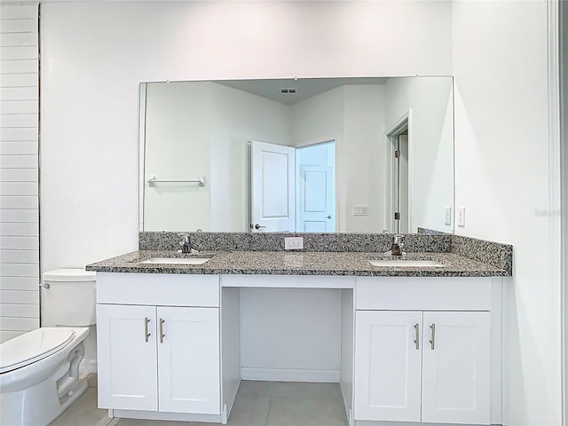 31771 Blue Passing Loop, Wesley Chapel, FL 33545 - full bath with double vanity, toilet, and tile patterned flooring