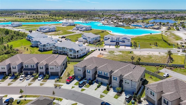 31771 Blue Passing Loop, Wesley Chapel, FL 33545 - aerial view of residential area featuring a pool and a large body of water