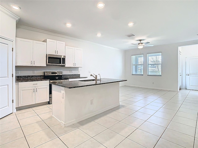 31771 Blue Passing Loop, Wesley Chapel, FL 33545 - kitchen featuring stainless steel appliances, light tile patterned floors, ceiling fan, a sink, and crown molding