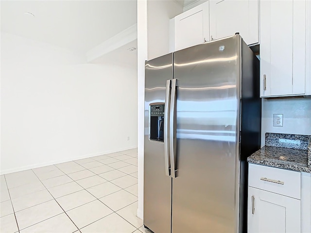 31771 Blue Passing Loop, Wesley Chapel, FL 33545 - kitchen featuring stainless steel fridge with ice dispenser, white cabinetry, dark stone counters, and light tile patterned floors