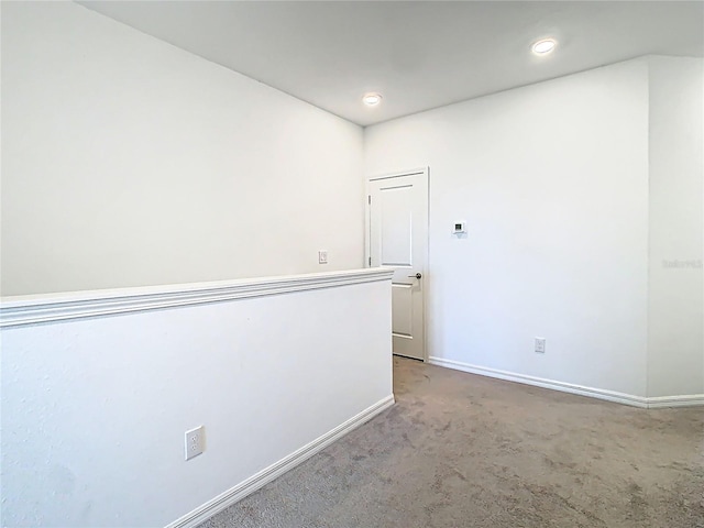 31771 Blue Passing Loop, Wesley Chapel, FL 33545 - spare room with baseboards, recessed lighting, and carpet