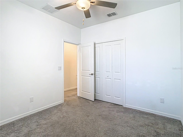 31771 Blue Passing Loop, Wesley Chapel, FL 33545 - unfurnished bedroom featuring carpet floors, a closet, baseboards, and ceiling fan