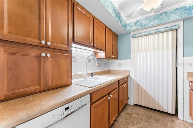 2630 Pearce Dr Unit 108, Clearwater, FL 33764 - kitchen with a sink, white dishwasher, brown cabinets, light countertops, and tasteful backsplash
