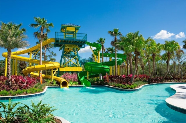 14501 Grove Resort Ave Unit 3316, Winter Garden, FL 34787 - community pool featuring a water slide and a water play area