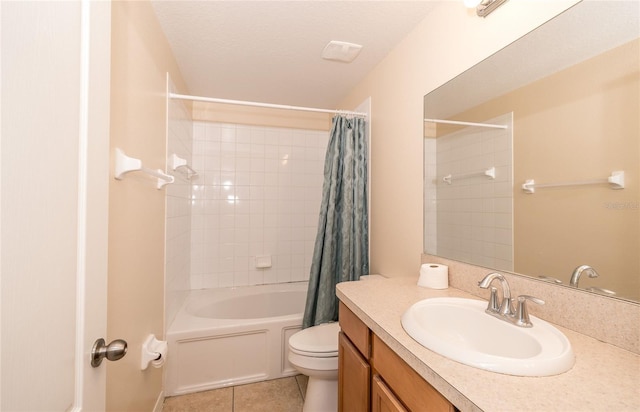 37712 Aaralyn Rd, Zephyrhills, FL 33542 - full bath featuring toilet, tile patterned floors, vanity, and shower / bath combo