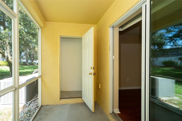 37712 Aaralyn Rd, Zephyrhills, FL 33542 - unfurnished sunroom with plenty of natural light