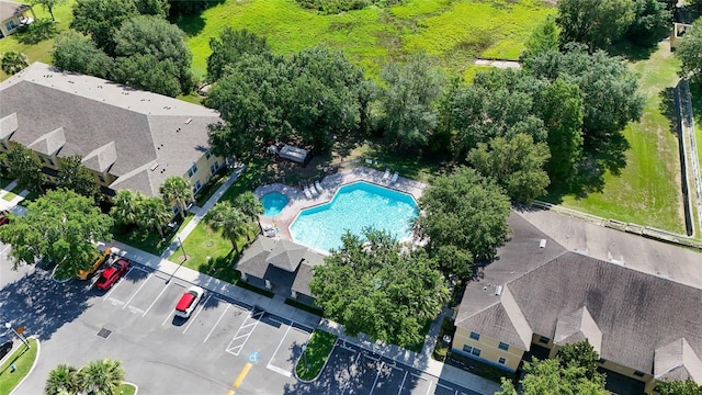 37712 Aaralyn Rd, Zephyrhills, FL 33542 - aerial view of a pool
