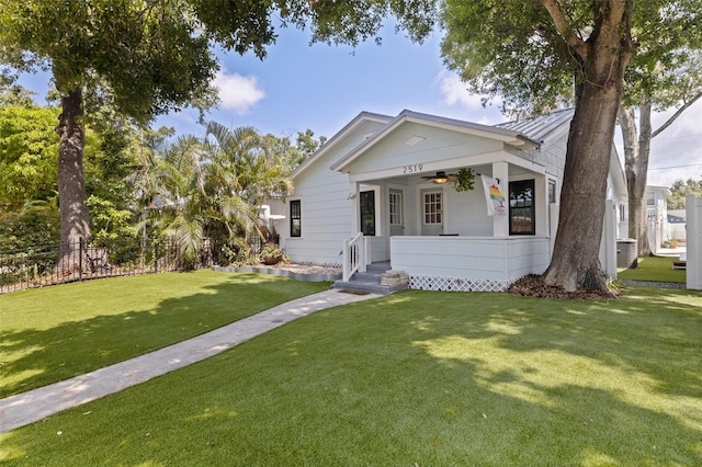2519 1st Ave N, Saint Petersburg, FL 33713 - view of front of house with covered porch, a ceiling fan, metal roof, and a standing seam roof