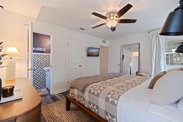 2519 1st Ave N, Saint Petersburg, FL 33713 - bedroom with dark wood-style floors and ceiling fan