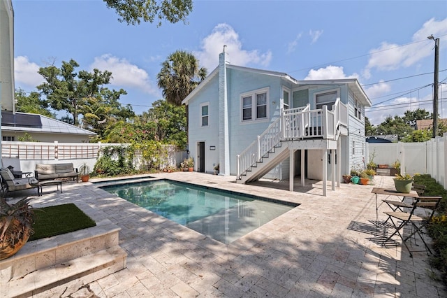 2519 1st Ave N, Saint Petersburg, FL 33713 - view of swimming pool featuring stairs, a fenced backyard, and a patio