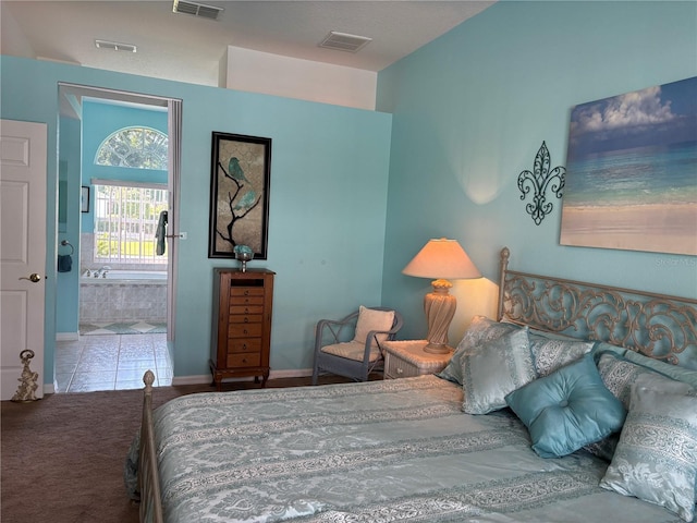 13339 Amberwood St, Hudson, FL 34669 - bedroom with carpet, baseboards, and ensuite bath