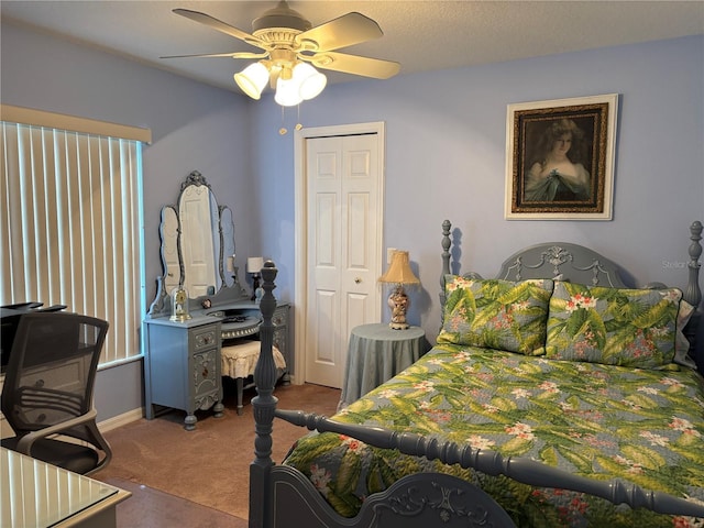 13339 Amberwood St, Hudson, FL 34669 - carpeted bedroom with a closet, a ceiling fan, and baseboards