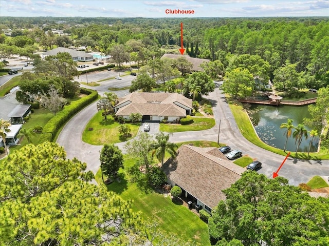 7633 Piping Rock Ct Unit 7633, New Port Richey, FL 34654 - drone / aerial view of a heavily wooded area and a nearby body of water