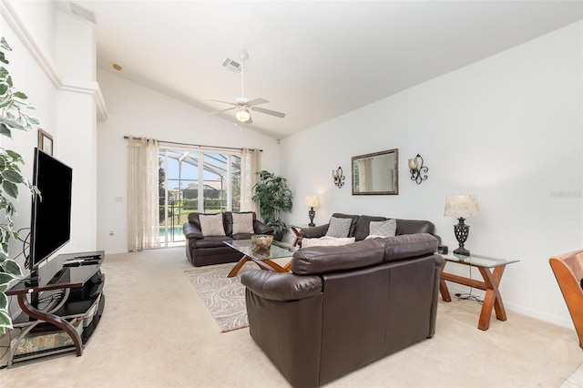 908 Andalusia Loop, Davenport, FL 33837 - living room featuring light colored carpet, ceiling fan, baseboards, and high vaulted ceiling