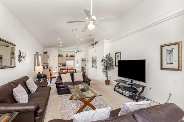 908 Andalusia Loop, Davenport, FL 33837 - living area with a ceiling fan, light colored carpet, recessed lighting, and lofted ceiling