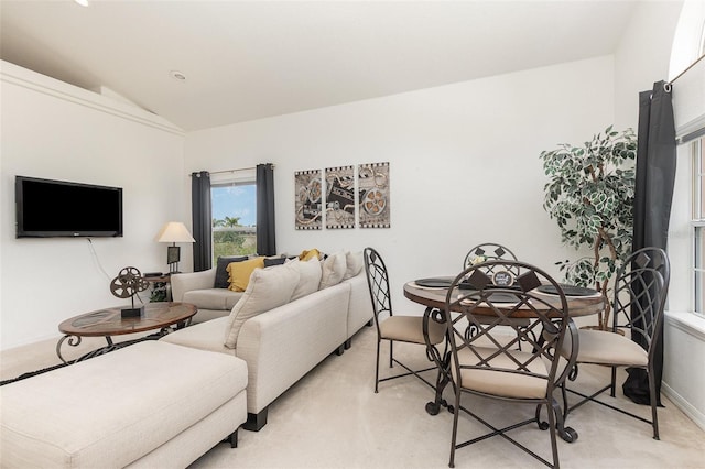 908 Andalusia Loop, Davenport, FL 33837 - living room featuring vaulted ceiling, light carpet, and recessed lighting