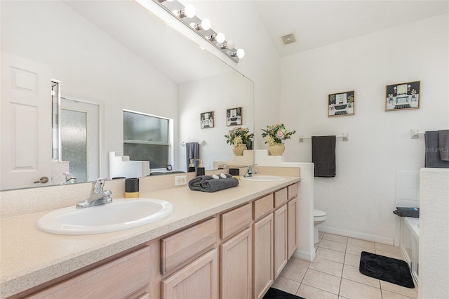 908 Andalusia Loop, Davenport, FL 33837 - full bathroom with toilet, double vanity, tile patterned flooring, high vaulted ceiling, and a tub to relax in