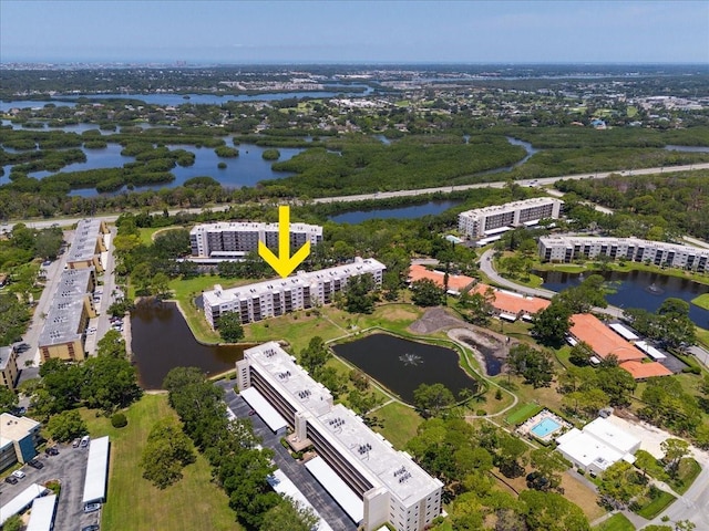 8174 Terrace Garden Dr N Unit 204, Saint Petersburg, FL 33709 - drone / aerial view of apartment complex and a nearby body of water