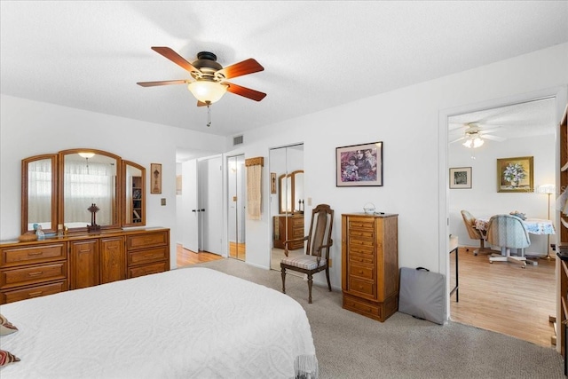 8174 Terrace Garden Dr N Unit 204, Saint Petersburg, FL 33709 - bedroom with a ceiling fan and light colored carpet