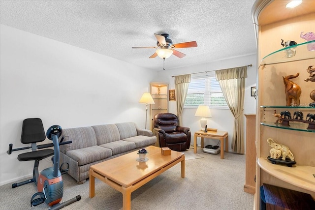 8174 Terrace Garden Dr N Unit 204, Saint Petersburg, FL 33709 - carpeted living area with a ceiling fan and a textured ceiling
