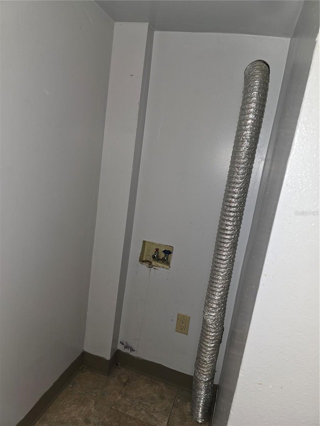 7168 E Bank Dr Unit 7168, Tampa, FL 33617 - washroom featuring hookup for an electric dryer, washer hookup, and baseboards