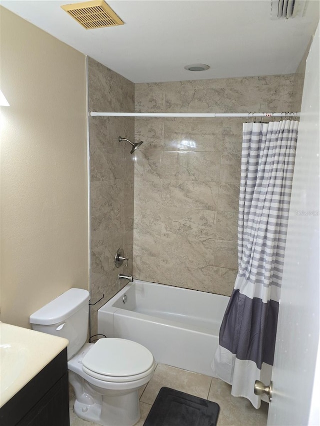 7168 E Bank Dr Unit 7168, Tampa, FL 33617 - bathroom featuring shower / tub combo, vanity, toilet, and tile patterned floors
