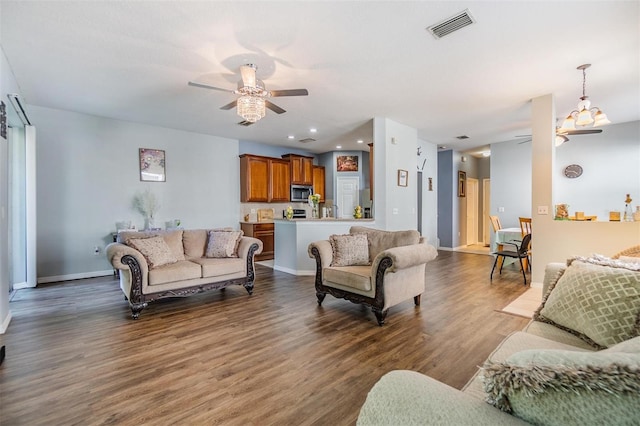 6736 Breezy Palm Dr, Riverview, FL 33578 - living room with ceiling fan, dark wood-style flooring, and baseboards