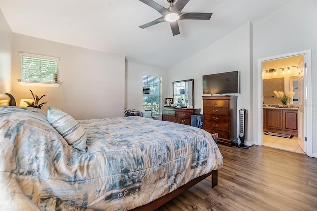 6736 Breezy Palm Dr, Riverview, FL 33578 - bedroom featuring lofted ceiling, wood finished floors, ceiling fan, and connected bathroom