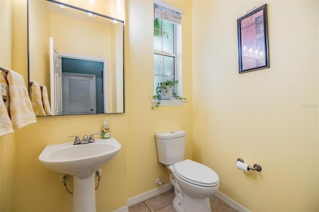 6736 Breezy Palm Dr, Riverview, FL 33578 - bathroom with toilet, baseboards, and tile patterned floors