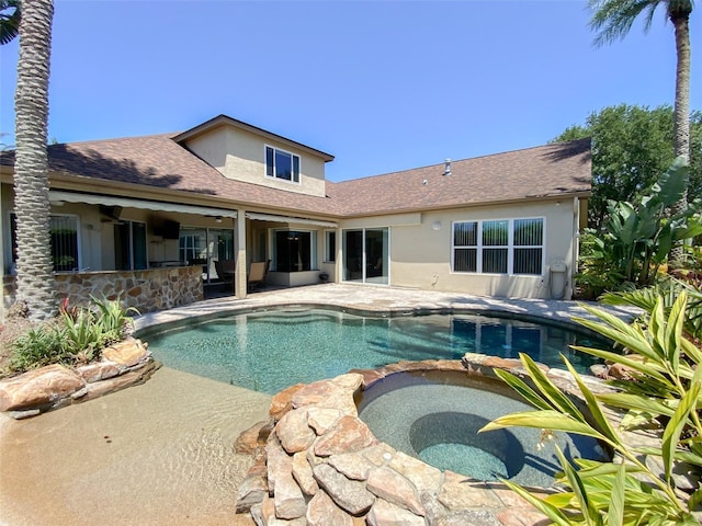 2041 Gold Dust Ct, Trinity, FL 34655 - view of swimming pool with a patio area and a pool with connected hot tub