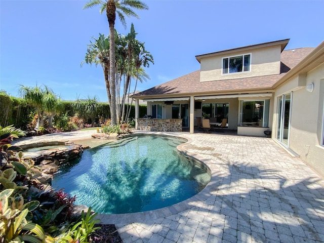 2041 Gold Dust Ct, Trinity, FL 34655 - view of swimming pool with a patio and a pool with connected hot tub