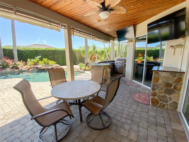2041 Gold Dust Ct, Trinity, FL 34655 - sunroom featuring an outdoor kitchen, ceiling fan, and outdoor dining space