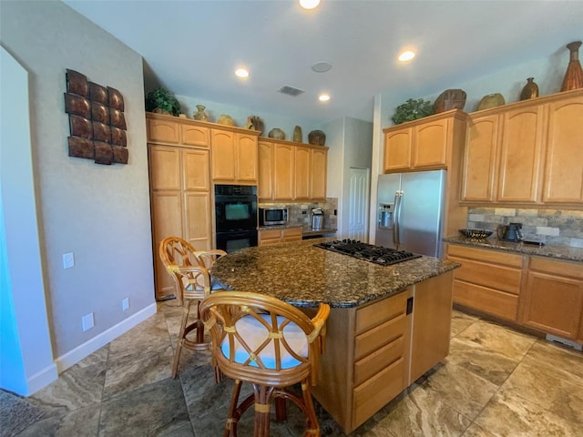 2041 Gold Dust Ct, Trinity, FL 34655 - kitchen with stainless steel appliances, tasteful backsplash, a center island, a kitchen breakfast bar, and recessed lighting