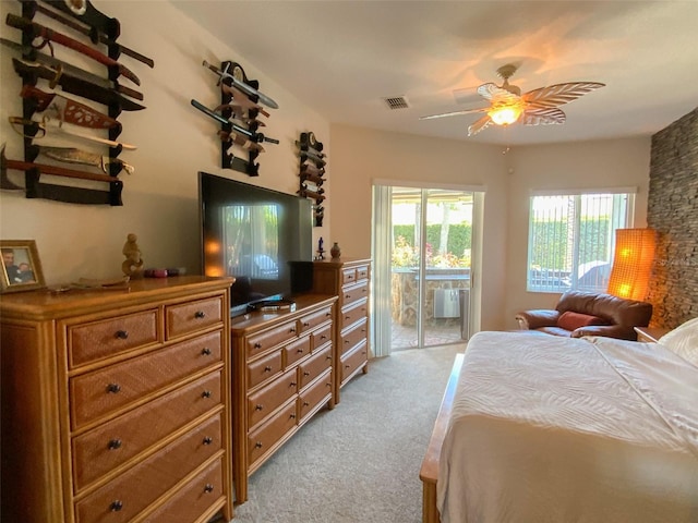 2041 Gold Dust Ct, Trinity, FL 34655 - bedroom featuring light colored carpet and access to exterior