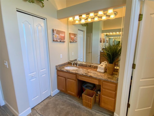 2041 Gold Dust Ct, Trinity, FL 34655 - bathroom with vanity and baseboards