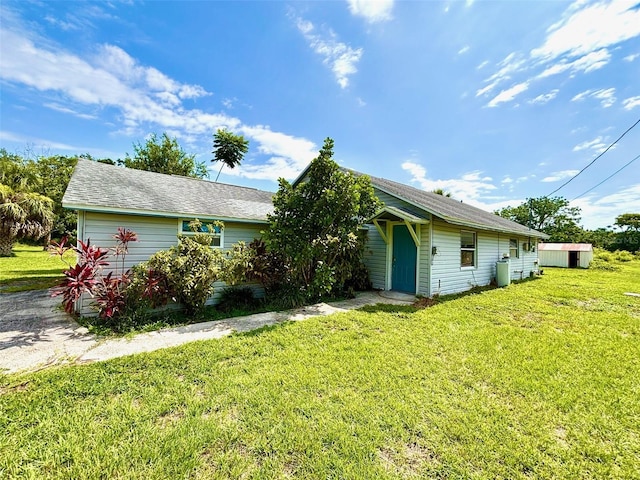14318 Guava St, Hudson, FL 34667 - ranch-style home featuring a front yard