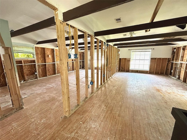 14318 Guava St, Hudson, FL 34667 - miscellaneous room featuring plenty of natural light, wooden walls, and wood finished floors