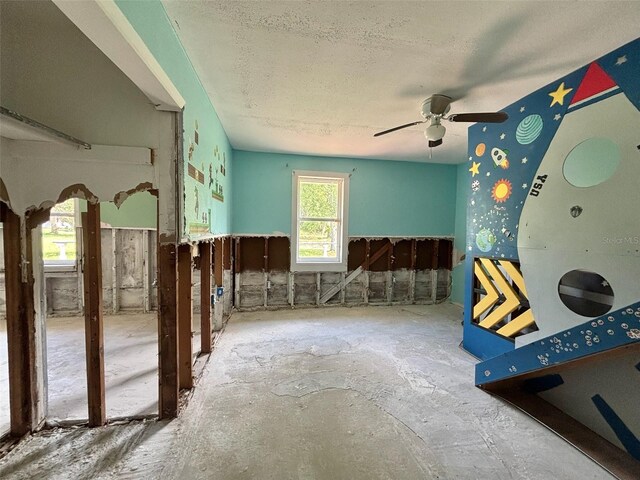 14318 Guava St, Hudson, FL 34667 - miscellaneous room with a ceiling fan and a textured ceiling