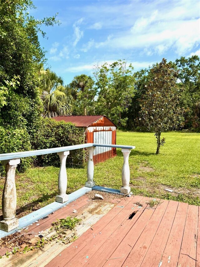14318 Guava St, Hudson, FL 34667 - deck featuring a yard