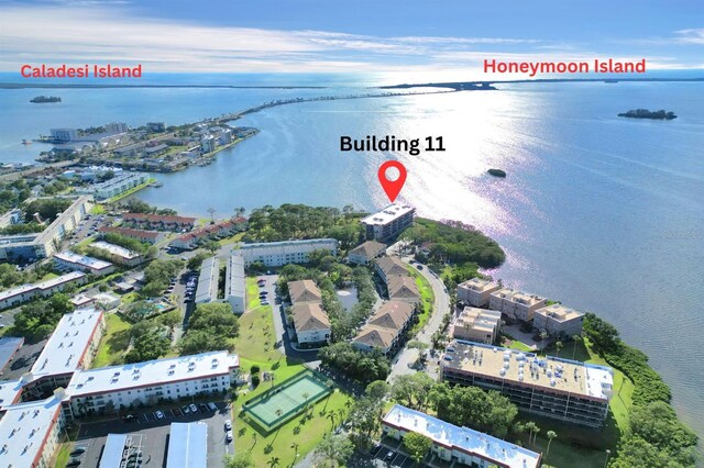 2700 Bayshore Blvd Unit 11308, Dunedin, FL 34698 - aerial overview of property's location featuring a large body of water and apartment complex