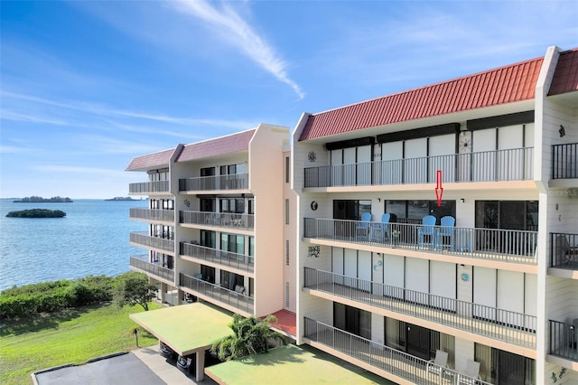 2700 Bayshore Blvd Unit 11308, Dunedin, FL 34698 - view of apartment building / complex with a water view