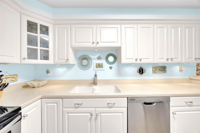 2700 Bayshore Blvd Unit 11308, Dunedin, FL 34698 - kitchen featuring stainless steel dishwasher, a sink, white cabinets, glass insert cabinets, and light countertops