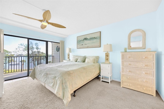 2700 Bayshore Blvd Unit 11308, Dunedin, FL 34698 - carpeted bedroom with access to outside and ceiling fan