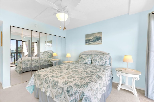 2700 Bayshore Blvd Unit 11308, Dunedin, FL 34698 - bedroom with carpet flooring, baseboards, and ceiling fan