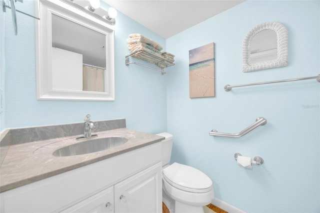 2700 Bayshore Blvd Unit 11308, Dunedin, FL 34698 - bathroom featuring vanity and toilet