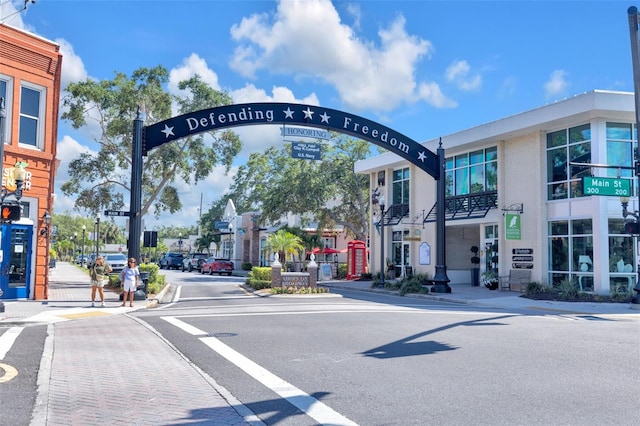 2700 Bayshore Blvd Unit 11308, Dunedin, FL 34698 - view of asphalt road featuring sidewalks, curbs, and street lights