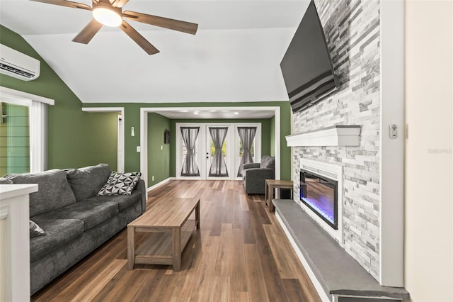 12516 Cobble Stone Dr, Hudson, FL 34667 - living room featuring vaulted ceiling, ceiling fan, wood finished floors, a wall mounted AC, and a fireplace
