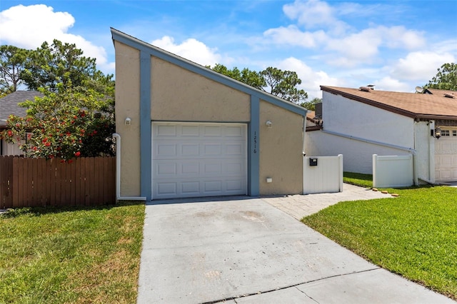 12516 Cobble Stone Dr, Hudson, FL 34667 - garage featuring driveway