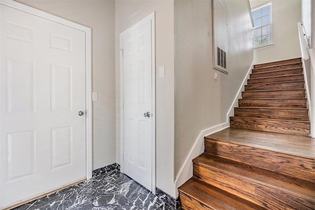 501 Knights Run Ave Unit 6104, Tampa, FL 33602 - stairway with marble look tile flooring